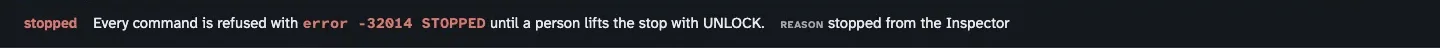 The Inspector's stop banner, saying every command is refused with error -32014 STOPPED until a person lifts the stop with UNLOCK